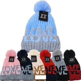 12 Bulk Women's Winter Fur Lining Love Style Hats With Pompoms In Assorted Colors